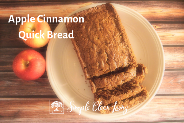 Picture of a loaf of sliced bread on a plate and the blog post title "Apple Cinnamon Quick Bread"