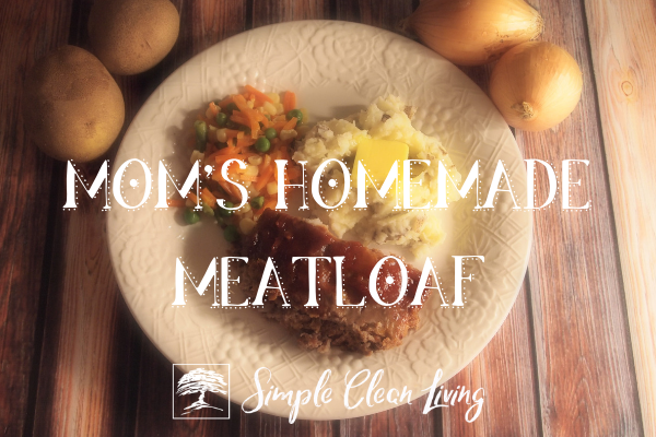 A plate with homemade meatloaf, mashed potatoes and mixed vegetables
