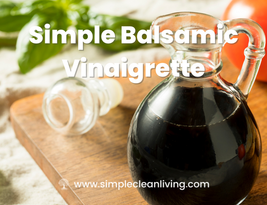Simple Balsamic Vinaigrette Blog Post- A picture of a bottle of balsamic vinegar on a cutting board