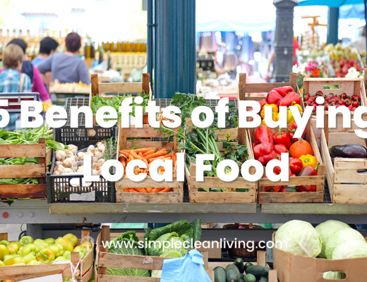 5 Benefits of Buying Local Food Blog Post- A picture of a farmers market with many crates filled with colorful fruits and vegetables