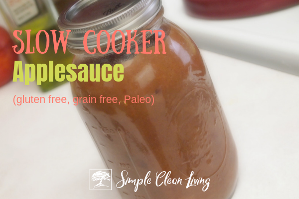 A picture of a canning jar full of applesauce with the blog post title "Slow Cooker Applesauce, gluten free, grain free, Paleo"