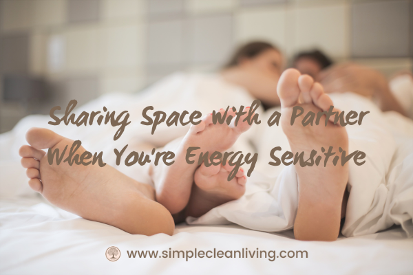 Sharing Space With A Partner When You're Energy Sensitive- picture of a couple in bed