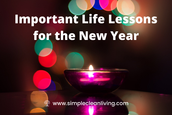 A candle burning with the post title "important life lessons for the new year"