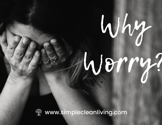 Why Worry? A photo of a woman holding her face in her hands