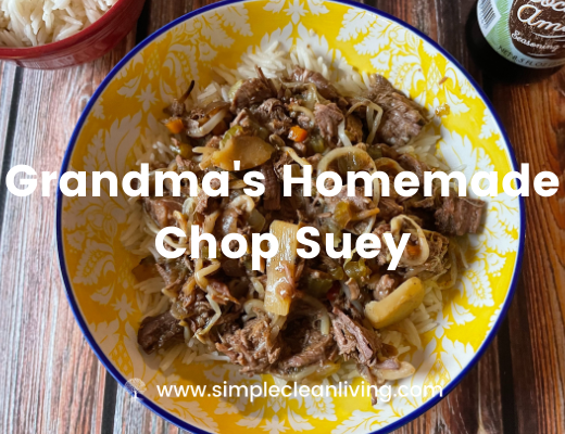 A colorful yellow bowl filled with homemade chop suey over rice