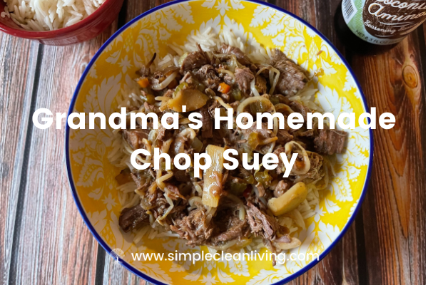 A colorful yellow bowl filled with homemade chop suey over rice