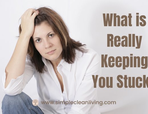 What is really keeping you stuck- picture of woman with frustrated look on her face