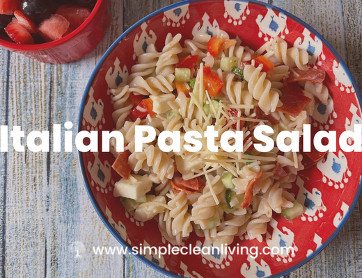 Italian Pasta Salad Recipe Post- Picture of a colorful red bowl filled with Italian pasta salad