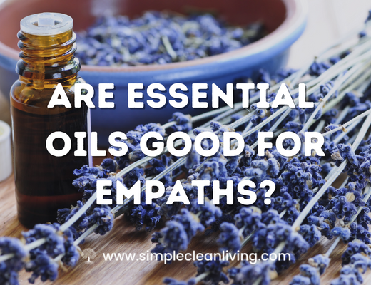 Are Essential Oils Good For Empaths- essential oil bottles and herbs scattered on a table