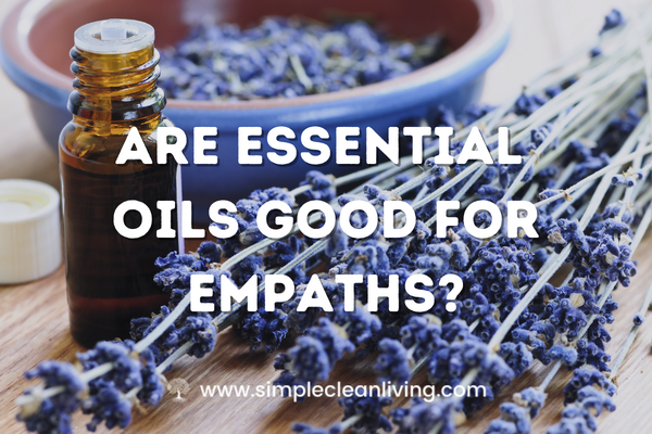 Are Essential Oils Good For Empaths- essential oil bottles and herbs scattered on a table