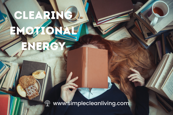 Clearing Emotional Energy- A woman who has her head buried in a book