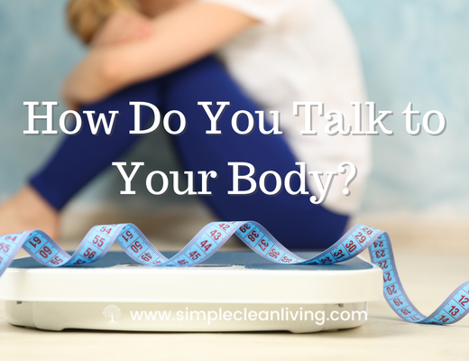 How to You Talk To Your Body Blog Post- Picture of a woman sitting with her head in her hands in a shameful position