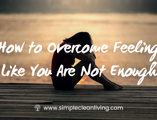 How to overcome feeling like you're not enough blog post- picture with a woman sitting curled up in shame