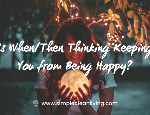Is When Then Thinking Keeping You From Being Happy- Picture of smiling woman holding a glowing globe