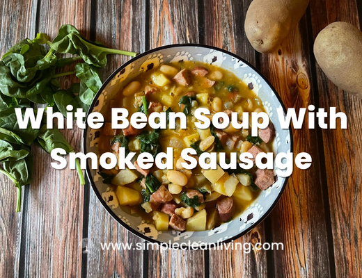 White Bean Soup with Smoked Sausage recipe blog post with a picture of a bowl of the soup