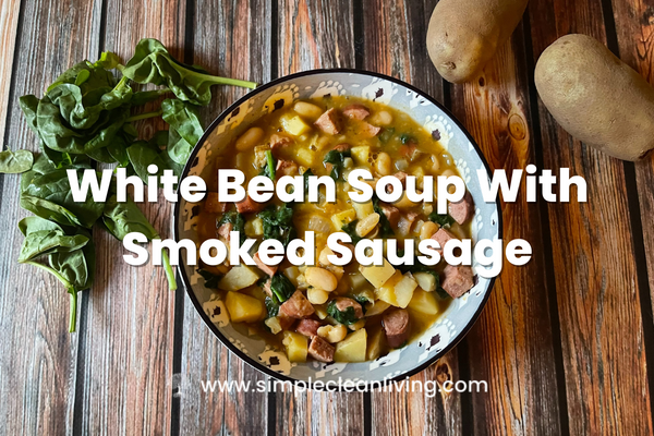 White Bean Soup with Smoked Sausage recipe blog post with a picture of a bowl of the soup