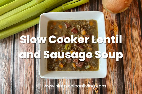 Slow Cooker Lentil and Sausage Soup recipe post featuring a bowl of lentil sausage soup on a wooden table