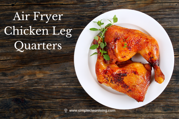 Air Fryer Chicken Leg Quarter recipe blog post- picture of two cooked chicken leg quarters on a wood background