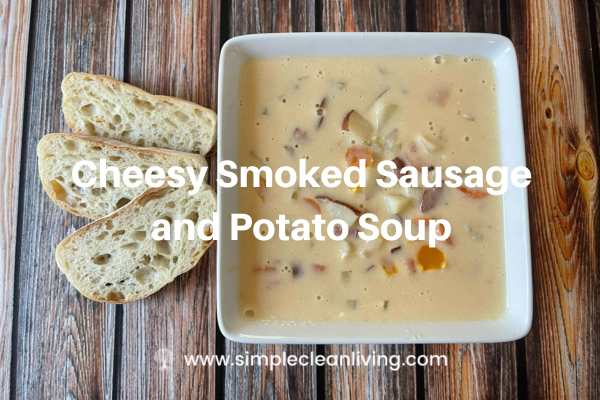 Cheesy Smoked Sausage and Potato Soup Recipe- with a picture of a bowl of the soup and some fresh bread
